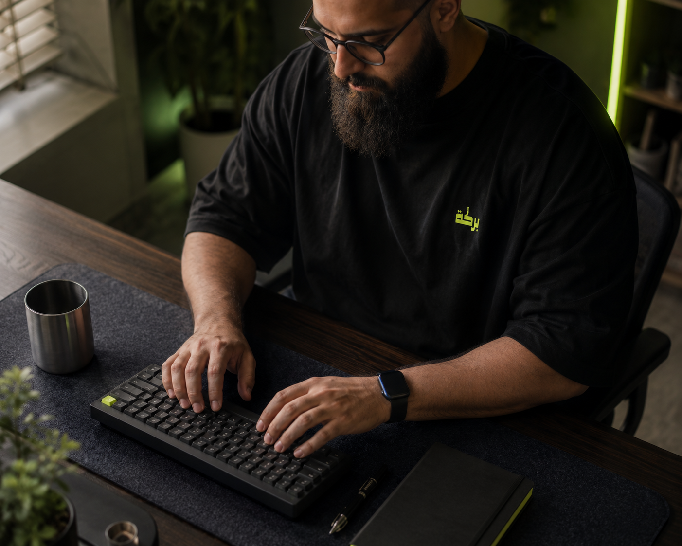 Hands on a keyboard, mid-build